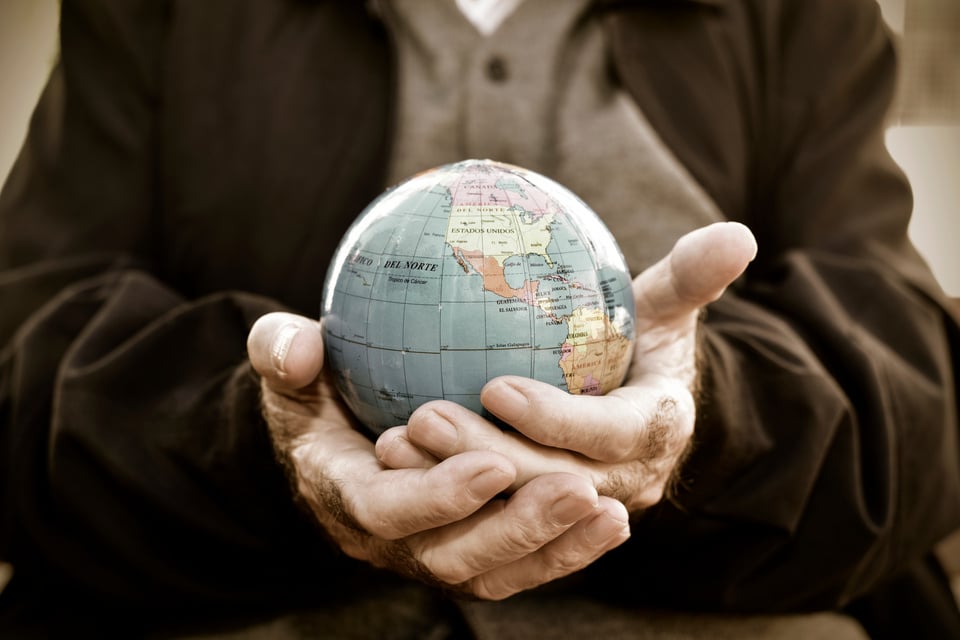 Old Man with a World Globe in His Hands